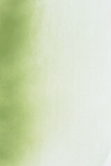 spray paint green on a white paper background