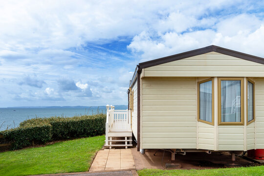 Caravan holiday park with white mobile houses, typical resort of English seaside.