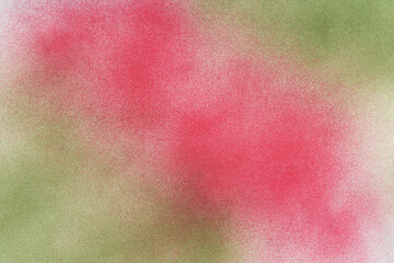 spray paint red and green on a white paper background