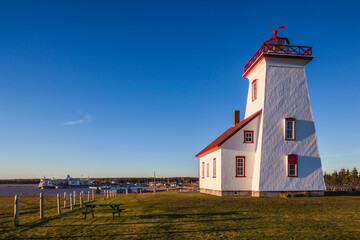 Fototapeta na wymiar Canada, Prince Edward Island, Wood Islands Lighthouse at sunset.