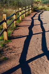 A wooden fence with a shadow from the sun, Garden of the Gods, US