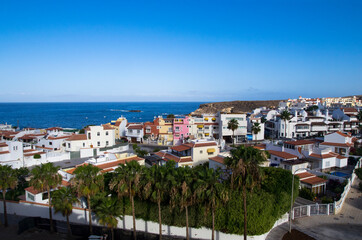 Fototapeta na wymiar Bright houses by the sea, Tenerife