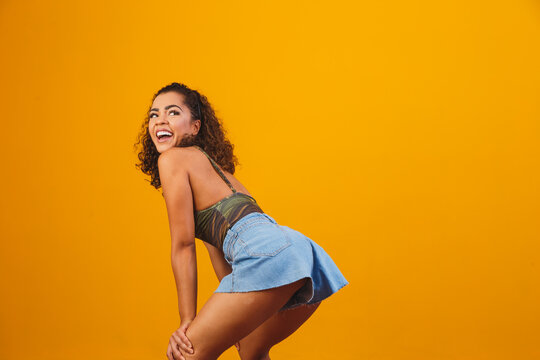 afro woman dancing funk with space for text. Woman dancing