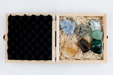 Isolated Natural Healing Crystals in Wooden Box with White Background