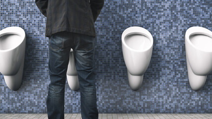 The man is peeing. Back view. Public toilet. Men's health topics.