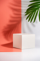 Cosmetics product advertising stand. Exhibition white podium with geometric shapes on a pink...