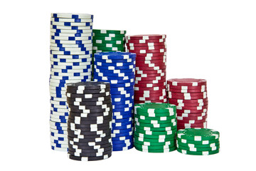 Stacks of poker chips including red, black, white, green and blue on a white background