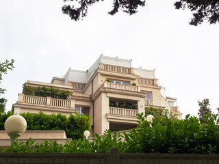 Fototapeta premium Elite private house with verandas and marble fittings surrounded by green plants