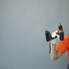 Repair man hand with drill mashine