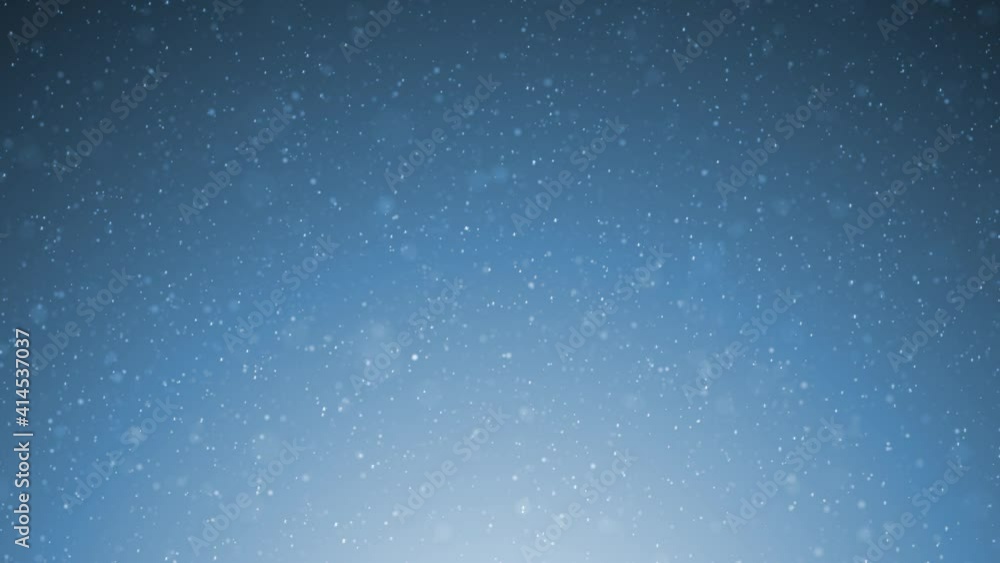 Wall mural beautiful snowflakes slowly falling down on a bright blue night sky