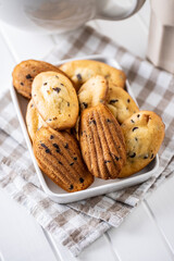 Madeleine with chocolate. Traditional French small cakes.