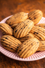 Madeleine with chocolate. Traditional French small cakes.