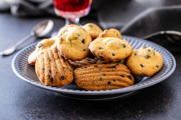 Madeleine with chocolate. Traditional French small cakes.