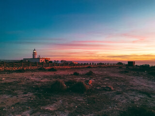 Fototapeta premium Sunset by the lighthouse