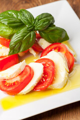 mozarella, basil and tomatoes