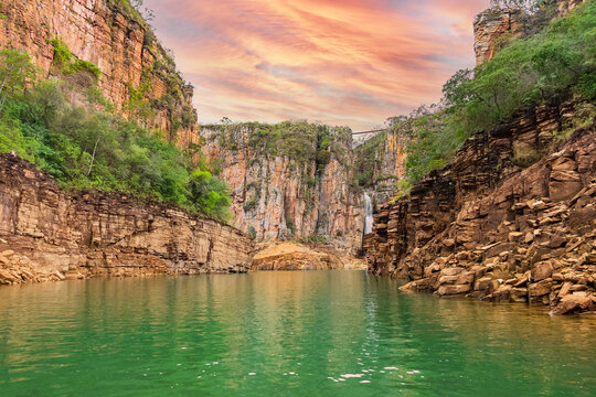 Canyons of Furnas at Capitólio MG, Brazil. Beautiful landscape of canyons of sedimentary rocks, green water lagoon on a colorful sunset. Brazilian tourist destination of Minas Gerais state.
