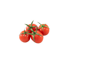 A few fresh tomatoes on a white background