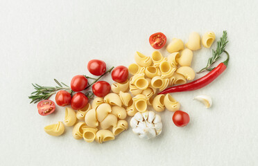Pasta lumaconi with pepper, garlic, tomato, and rosemary.