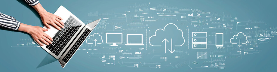 Obraz na płótnie Canvas Cloud computing with person using a laptop computer