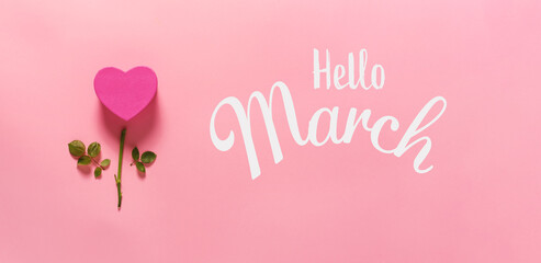 Hello March message with heart flower top view flat lay