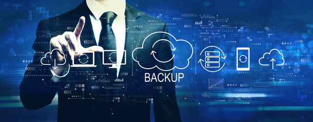 Fototapeta na wymiar Backup concept with businessman on a dark blue background
