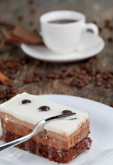 coffee with chocolate and multi-layer cake