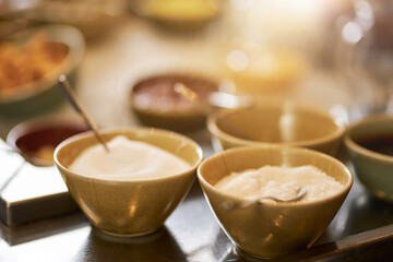 Kitchen table set-up with ingredients in bowls