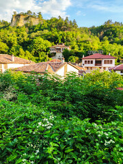 Fototapeta premium Typical street and houses in historical town of Melnik, Bulgaria