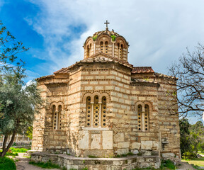 Fototapeta premium Ancient Agora Marketplace, Byzantine Church of Holy Apostles of Solaki, Acropolis, Athens, Greece. Agora founded 6th Century BC