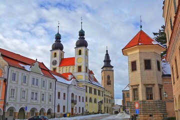 Fototapeta premium Old buildings and church in main square in Telc town, Czech Republic, UNESCO.