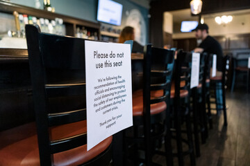 Crisis: Sign Says To Leave Stool Empty Due To Social Distancing