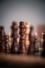 Chess pieces set up ready to play chess game on a wooden board strategy game kings head to head...