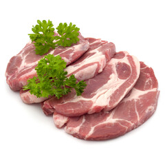 Raw pork neck chop meat with parsley herb leaves garnish isolated on white background cutout