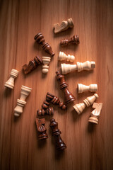 Chess pieces with scissors on a table