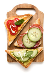Open  faced sandwich canape or crostini on a wooden serving board  isolated on white background closeup. Top view.