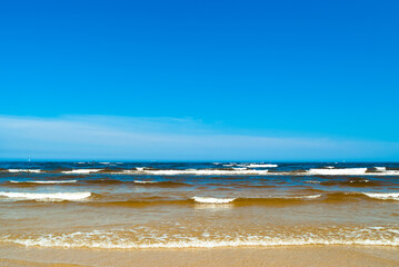 seashore, in the photo sea water against the blue sky