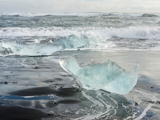Icebergs on black volcanic beach, Iceland.