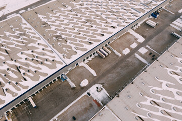 Aerial view of the distribution center, drone photography of the industrial logistic zone.