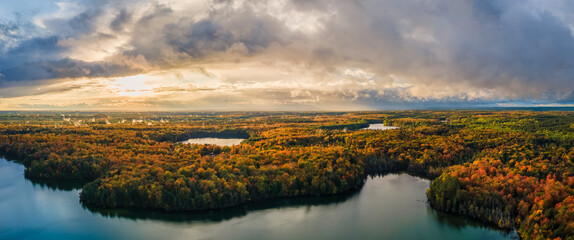 Spectacular autumn sunset over Pete’s Lake Campground 	in the Hiawatha National Forest – Michigan Upper Peninsula – aerial view