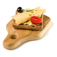 Open  faced cheese sandwich canape or crostini on a wooden serving board  isolated on white background closeup.  Vegetarian tartarine.