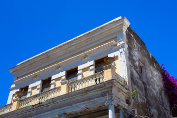 Building in disrepair with typical Caribbean architecture 