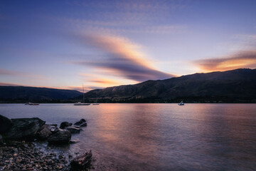 Beautiful Sunset at Lake Wanaka -View from Eely Point Recreation Reserve. Wanaka is a popular ski...