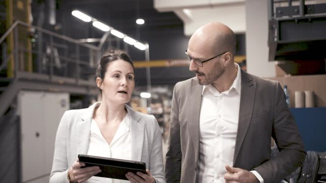business meeting in industrial plant