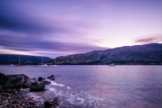 Wonderful Colors after Sunset at Wanaka lakefront from Eely Point Recreation Reserve. Wanaka is a popular ski and summer resort town in the Otago Region of the Southern Island of New Zealand.