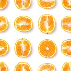 Seamless pattern of orange fruit halves. Orange fruit isolated on white background. Food background. Flat lay, top view.
