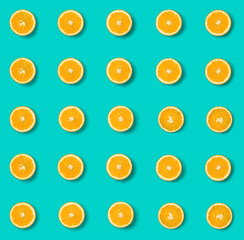  Fruit pattern of orange slices on blue background. Flat lay, top view. Food background. Seamless pattern.