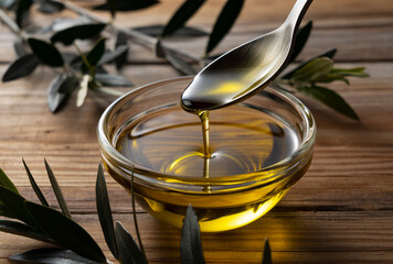 Olive oil on a wooden background