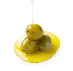 Zelfklevend Fotobehang Pouring olive oil on olives placed on a white background © m________k____