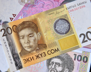 current money of kirguistan with selective focus