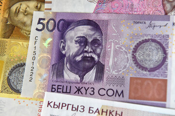 current money of kirguistan with selective focus